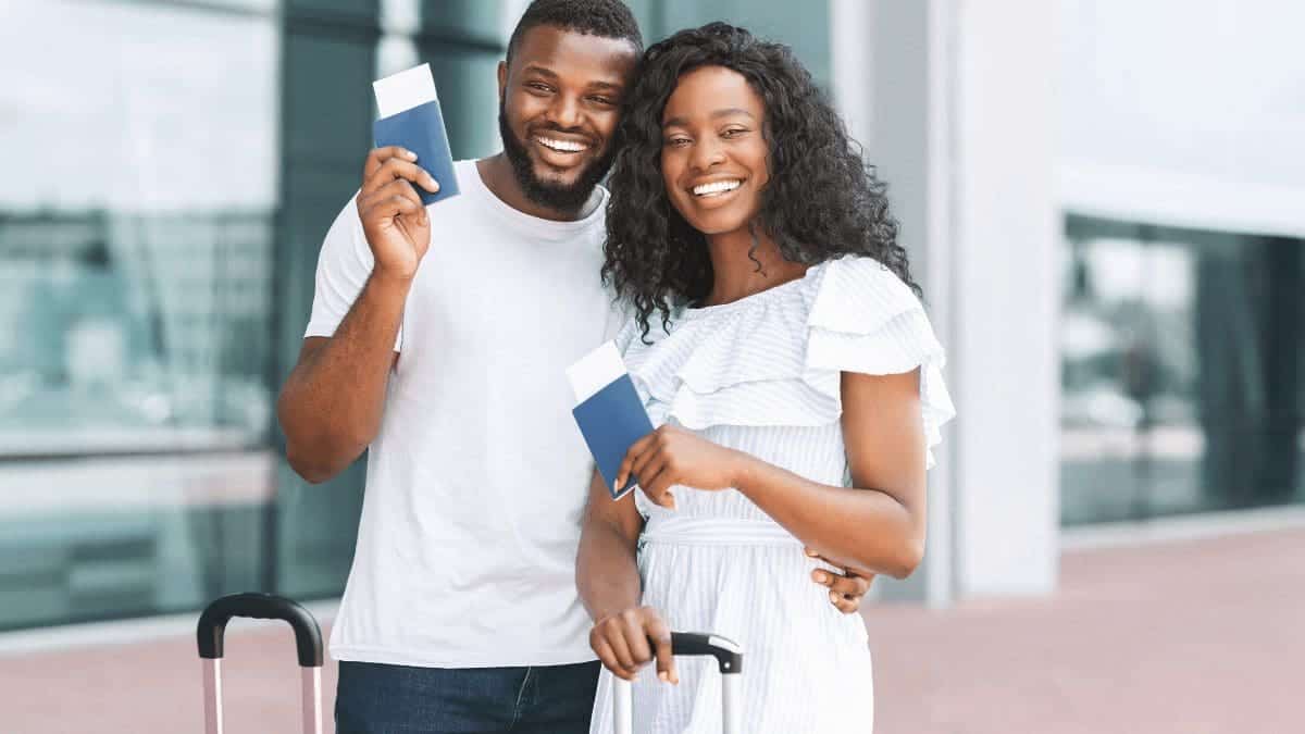 A couple heading on vacation booked using employee travel incentives.