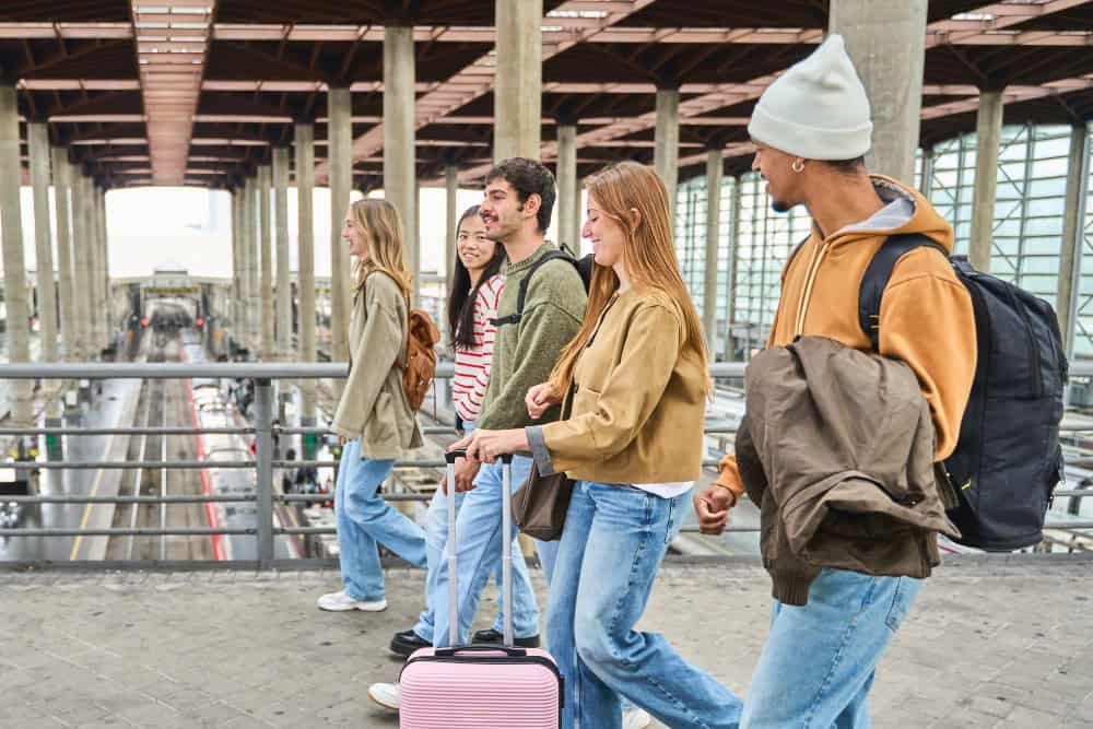 Group of young travelers with luggage