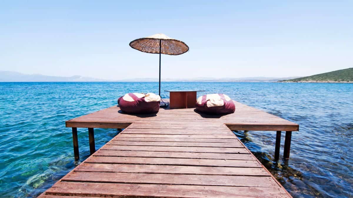 Two chairs set up on a dock at lake tahoe membership travel clubs.
